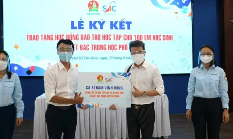 Ca sĩ Đàm Vĩnh Hưng bảo trợ học tập cho 100 trẻ em mồ côi